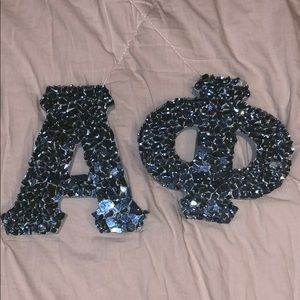 A and Phi sorority letters